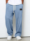 STEFAN | WIDE-LEG TROUSERS WITH AN ADJUSTABLE WAISTBAND